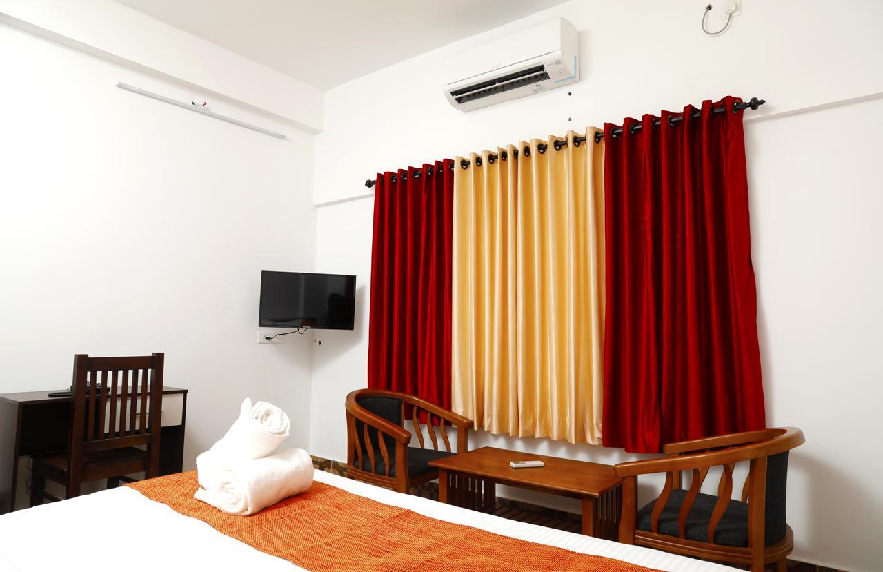 Puthens Clifton Inn Kottayam Exterior foto