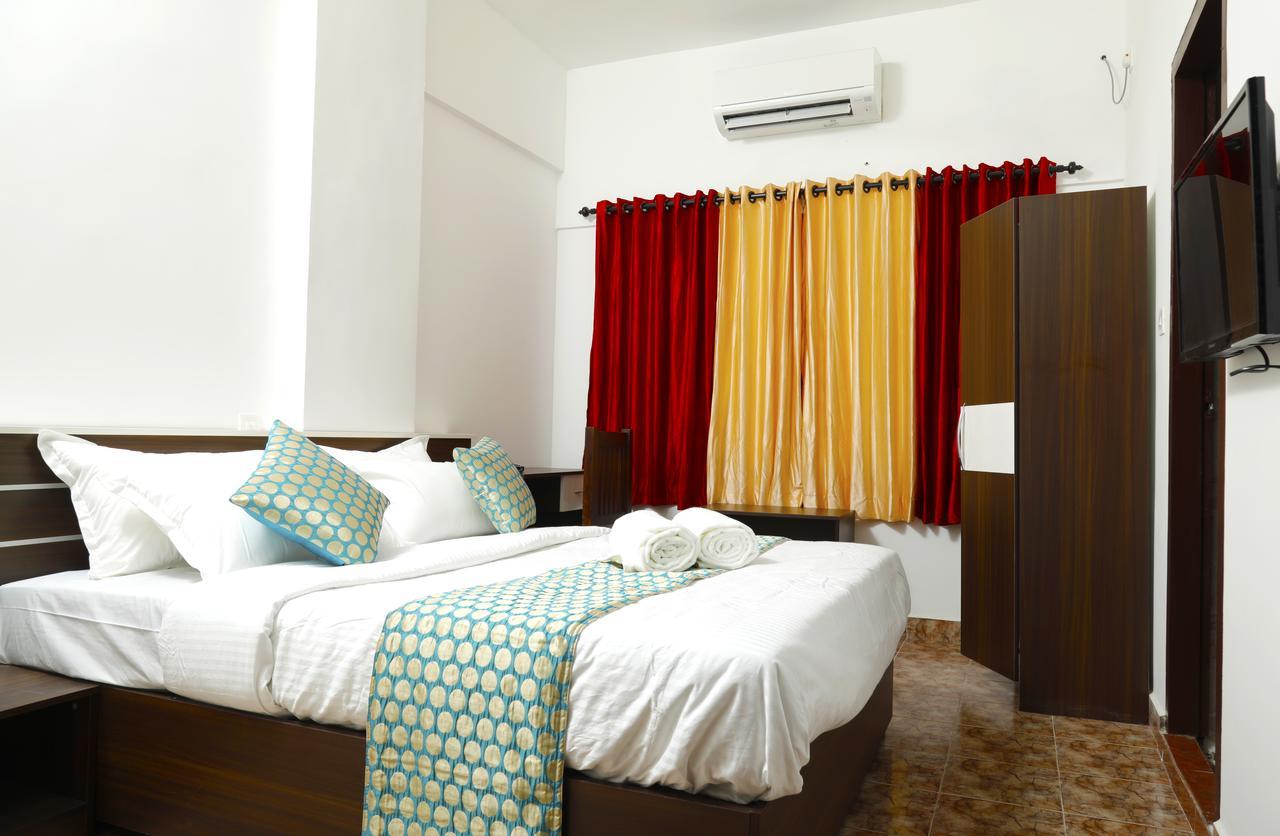 Puthens Clifton Inn Kottayam Exterior foto