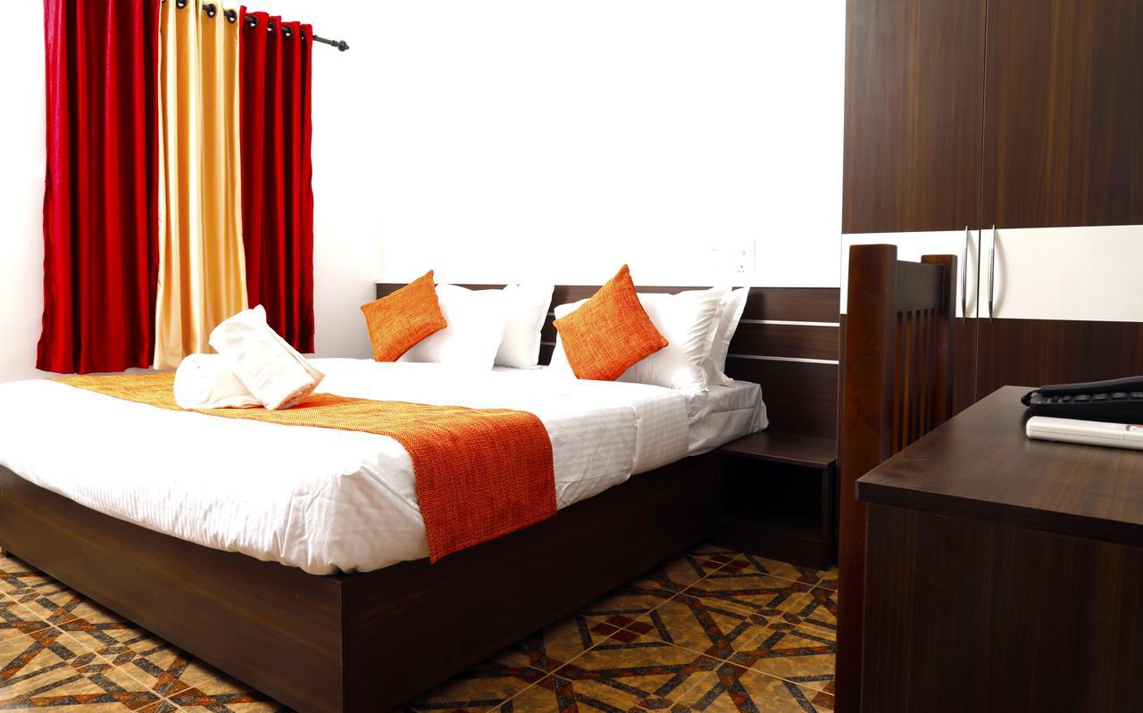 Puthens Clifton Inn Kottayam Exterior foto