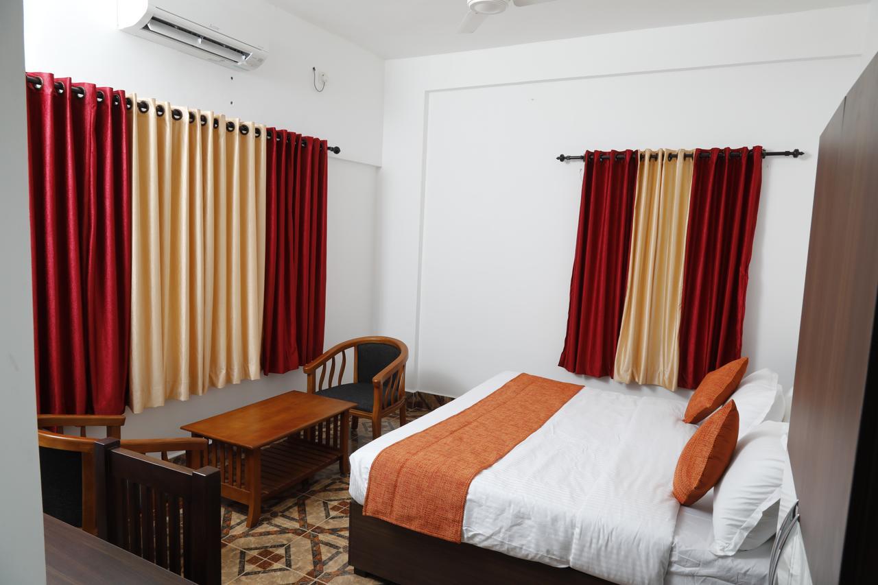 Puthens Clifton Inn Kottayam Exterior foto